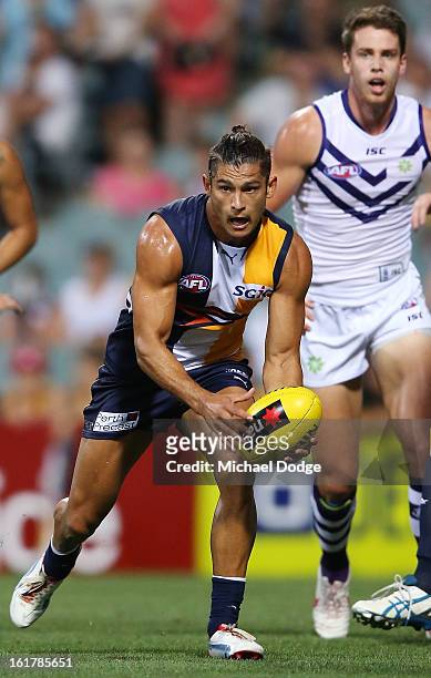 Sharrod Wellingham of the West Coast Eagles runs with the ball during the round one NAB Cup match between the West Coast Eagles and the Fremantle...