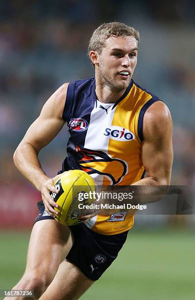 Matt Jacob Brennan of the West Coast Eagles runs with the ball during the round one NAB Cup match between the West Coast Eagles and the Fremantle...