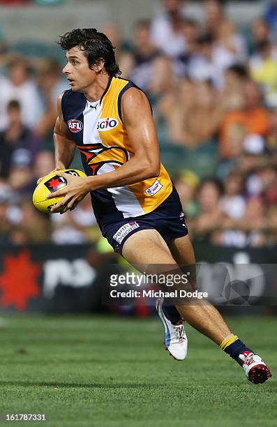 Andrew Embley of the West Coast Eagles runs with the ball during the round one NAB Cup match between the West Coast Eagles and the Fremantle Dockers...