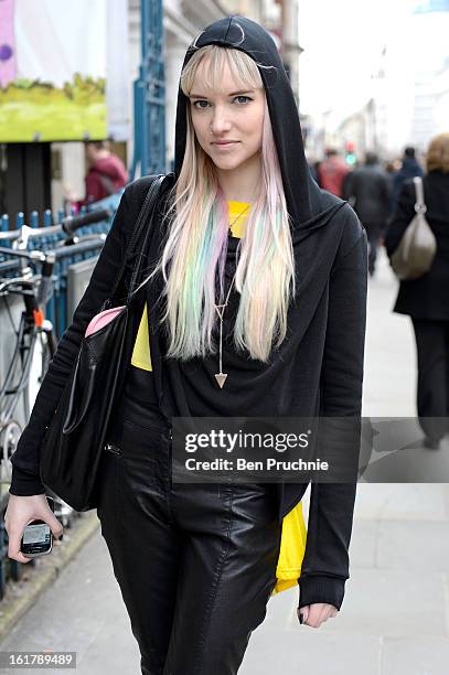 Writer Lucinda poses wearing a Sanctus jacket, Vintage leather trousers, ASOS shoes and a H+M bag outside the John Rocha catwalk show at Somerset...