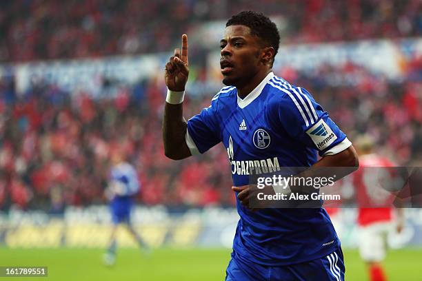 Michel Bastos of Schalke celebrates his team's first goal during the Bundesliga match between 1. FSV Mainz 05 and FC Schalke 04 at Coface Arena on...