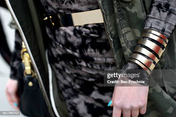 Julliette poses wearing an outfit from River Island with a hat and jewellery from a Polish market with a Moschino bag at Somerset House during London...