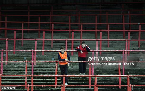 Ballboys watch on from an empty stand during the FA Trophy Semi-Final match between Wrexham and Gainsborough Trinity at the Racecourse Ground on...