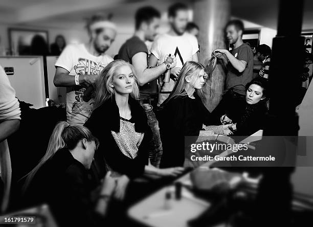 Models backstage before the Moschino cheap and chic show as part of London Fashion Week Fall/Winter 2013/14 on February 16, 2013 in London, England.