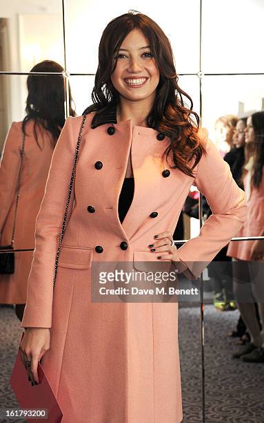 Daisy Lowe attends the Moschino cheap&chic show during London Fashion Week Fall/Winter 2013/14 at The Savoy Hotel on February 16, 2013 in London,...