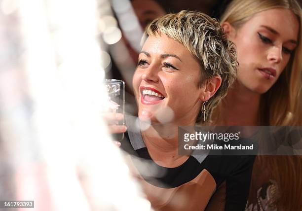Jaime Winstone attends the Julien Macdonald show during London Fashion Week Fall/Winter 2013/14 at Goldsmiths' Hall on February 16, 2013 in London,...