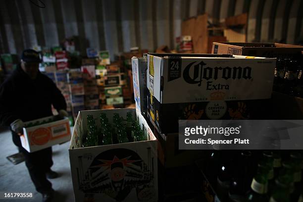 Boxes of empty beer bottles are staked for recycling at Sure We Can, a non-profit bottle redemption center in Bushwick, Brooklyn that is pushing to...