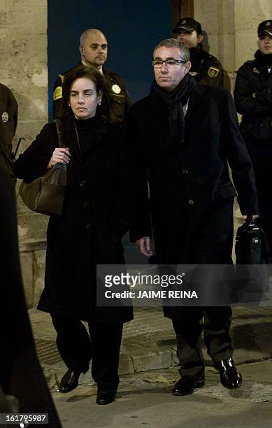 Diego Torres , former partner of Spain's Duke of Palma, and his wife Ana Maria Tejeiro leave a courthouse in Palma de Mallorca on February 16 to...