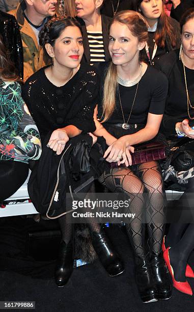 Noor Fares and Eugenie Niarchos attend and the Issa London show during London Fashion Week Fall/Winter 2013/14 at Somerset House on February 16, 2013...