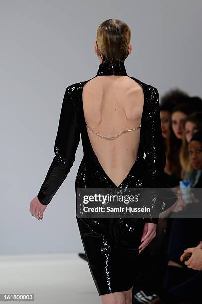 Model walks the runway at the Dans La Vie show during London Fashion Week Fall/Winter 2013/14 at Freemasons Hall on February 16, 2013 in London,...