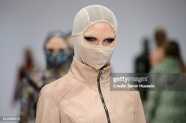 Model walks the runway at the Dans La Vie show during London Fashion Week Fall/Winter 2013/14 at Freemasons Hall on February 16, 2013 in London,...