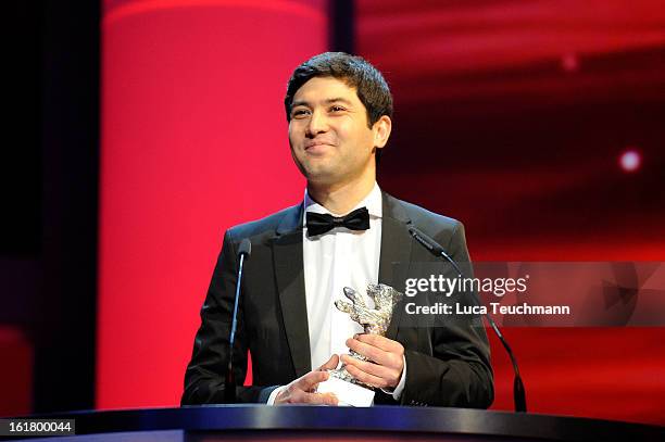 Cinematographer Aziz Zhambakiyev receives the award for best camera at the Closing Ceremony during the 63rd Berlinale International Film Festival at...