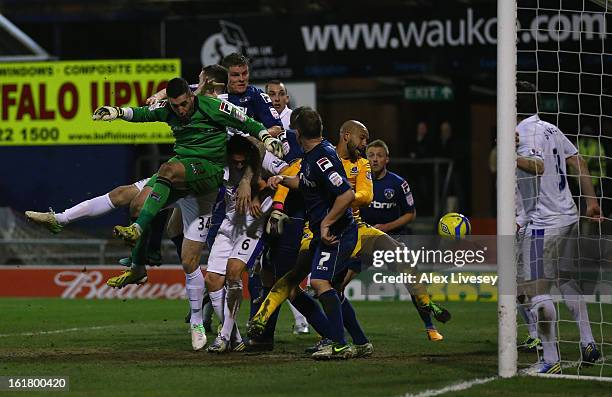 Matt Smith of Oldham Athletic scores his team's second goal to make the score 2-2 during the FA Cup with Budweiser Fifth Round match between Oldham...