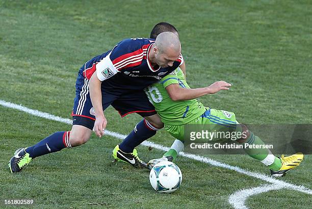 Soares of the New England Revolution defends against David Estrada of the Seattle Sounders during FC Tucson Desert Diamond Cup at Kino Sports Complex...