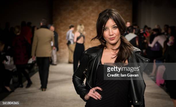 Daisy Lowe attends the House of Holland show during London Fashion Week Fall/Winter 2013/14 at Brewer Street Car Park on February 16, 2013 in London,...