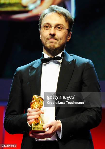 Director Calin Peter Netzer on stage after receiving the Golden Bear at the Closing Ceremony during the 63rd Berlinale International Film Festival at...