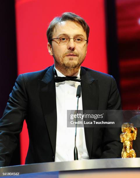 Director Calin Peter Netzer on stage after receiving the Golden Bear at the Closing Ceremony during the 63rd Berlinale International Film Festival at...