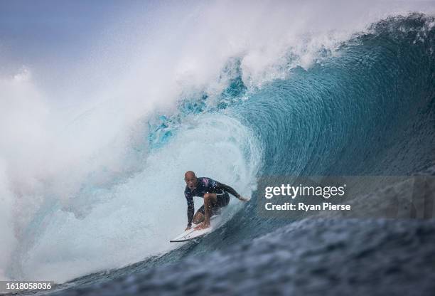 Kelly Slater of United States surfs during the Round of 16 heat on August 15, 2023 in Teahupo'o, French Polynesia.