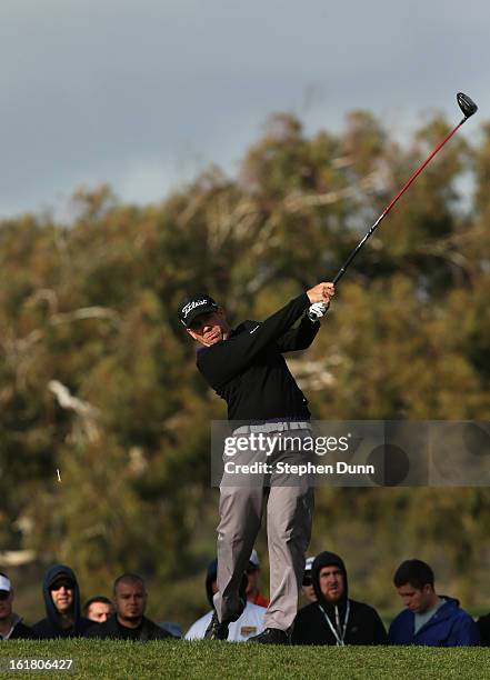 Erik Compton his tee shot on the second hole during the final round of the Farmers Insurance Open on the South Course at Torrey Pines Golf Course on...