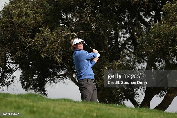 Brandt Snedeker hits his tee shot on the third hole during the final round of the Farmers Insurance Open on the South Course at Torrey Pines Golf...