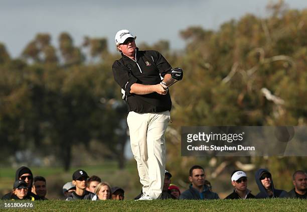 Brad Fritsch watches his tee shot on the second hole during the final round of the Farmers Insurance Open on the South Course at Torrey Pines Golf...