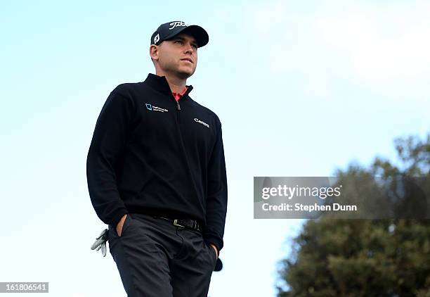 Bill Haas walks off the tee on the third hole during the final round of the Farmers Insurance Open on the South Course at Torrey Pines Golf Course on...