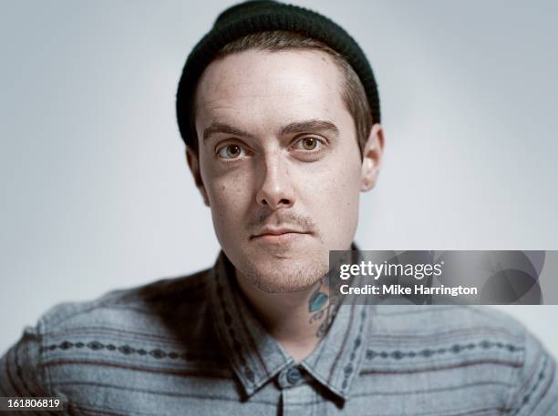 man with woolly hat looking direct to camera. - hipster stock pictures, royalty-free photos & images