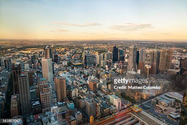 aerial view of melbourne at sunset - melbourne aerial view stockfoto's en -beelden