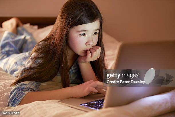 on computer without parental control - image focus technique photos stock pictures, royalty-free photos & images