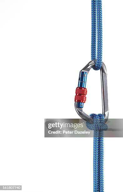 karabiner hanging on white background - 登山用具　無人 ストックフォトと画像