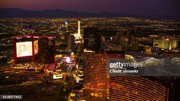 view of hotels on neon light in las vegas - vegas neon stock pictures, royalty-free photos & images