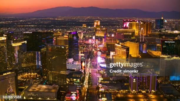 view of hotels in las vegas - big wheel stock pictures, royalty-free photos & images