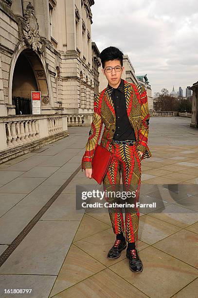 Blogger and Archiecture student Toni Tran wears Dent de man suit, black Top Shop shirt, John Lewis clutch, Zara shoes personalized with Hickies neon...