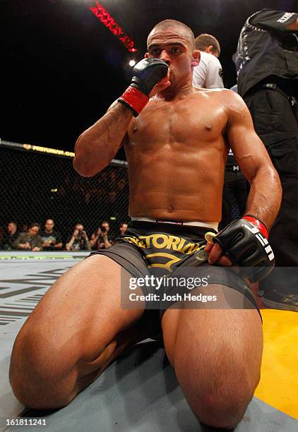 Renan Barao reacts after defeating Michael McDonald in their interim bantamweight title fight during the UFC on Fuel TV event on February 16, 2013 at...