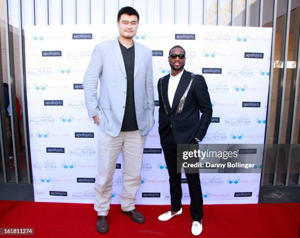 Yao Ming and Dwyane Wade attend D. Wade's Apollo Jets All Star Luncheon on February 16, 2013 in Houston, Texas.