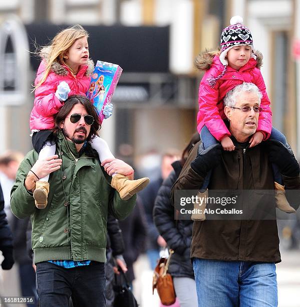 Dave Grohl, James Grohl, Harper Willow Grohl and Violet Maye Grohl are seen in Midtown on February 16, 2013 in New York City.