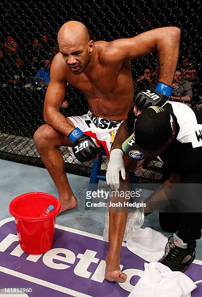 Cyrille Diabate sits on his stool in pain after suffering an injury against Jimi Manuwa in their light heavyweight fight during the UFC on Fuel TV...