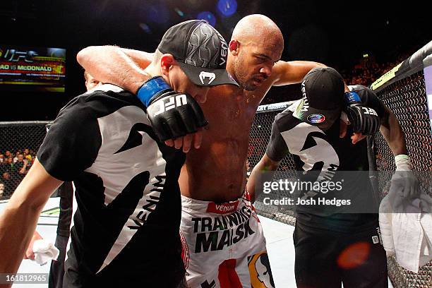 Cyrille Diabate is carried from the Octagon after suffering an injury against Jimi Manuwa in their light heavyweight fight during the UFC on Fuel TV...