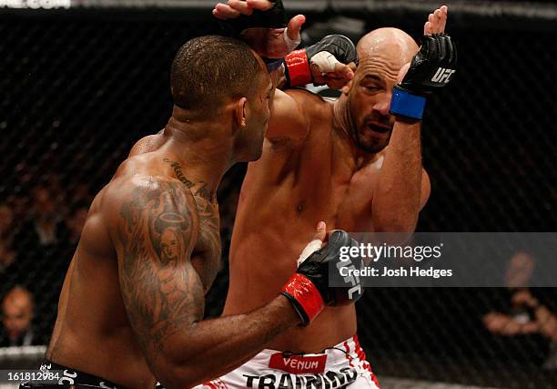 Jimi Manuwa punches Cyrille Diabate in their light heavyweight fight during the UFC on Fuel TV event on February 16, 2013 at Wembley Arena in London,...