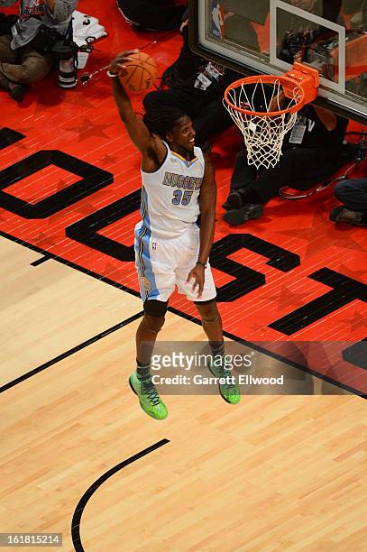 Kenneth Faried of Team Chuck goes up for the slam dunk against Team Shaq during 2013 BBVA Rising Stars Challenge at Toyota Center on February 15,...