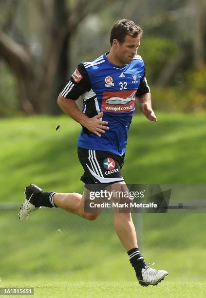 Lucas Neill runs during a Sydney FC A-League training session at Macquarie Uni on February 17, 2013 in Sydney, Australia.