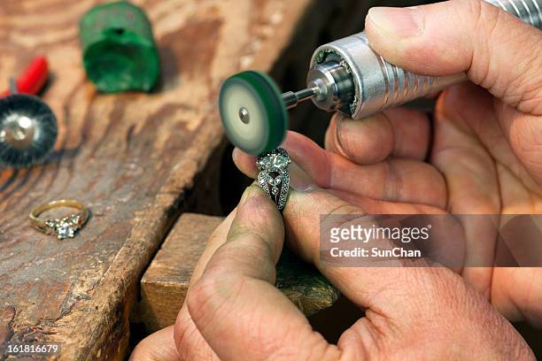 ring repairing & polishing - jeweller stock pictures, royalty-free photos & images