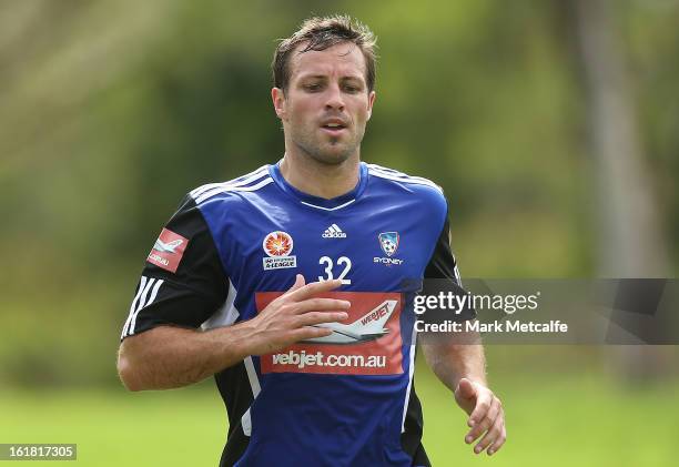 Lucas Neill runs during a Sydney FC A-League training session at Macquarie Uni on February 17, 2013 in Sydney, Australia.