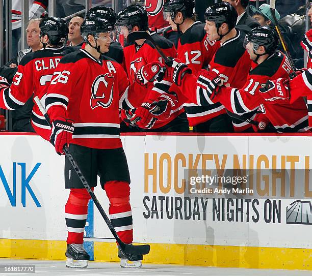 Patrik Elias of the New Jersey Devils is congratulated after scoring a goal against Philadelphia Flyers at the Prudential Center on February 15, 2013...