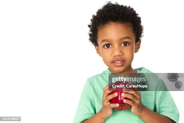 young boy holding apple - child holding apples stockfoto's en -beelden