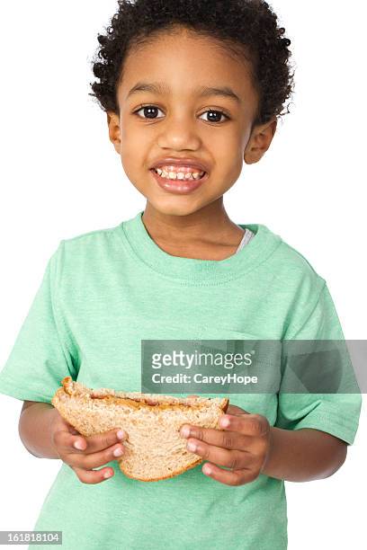 young boy with lunch - peanut butter and jelly sandwich stock pictures, royalty-free photos & images