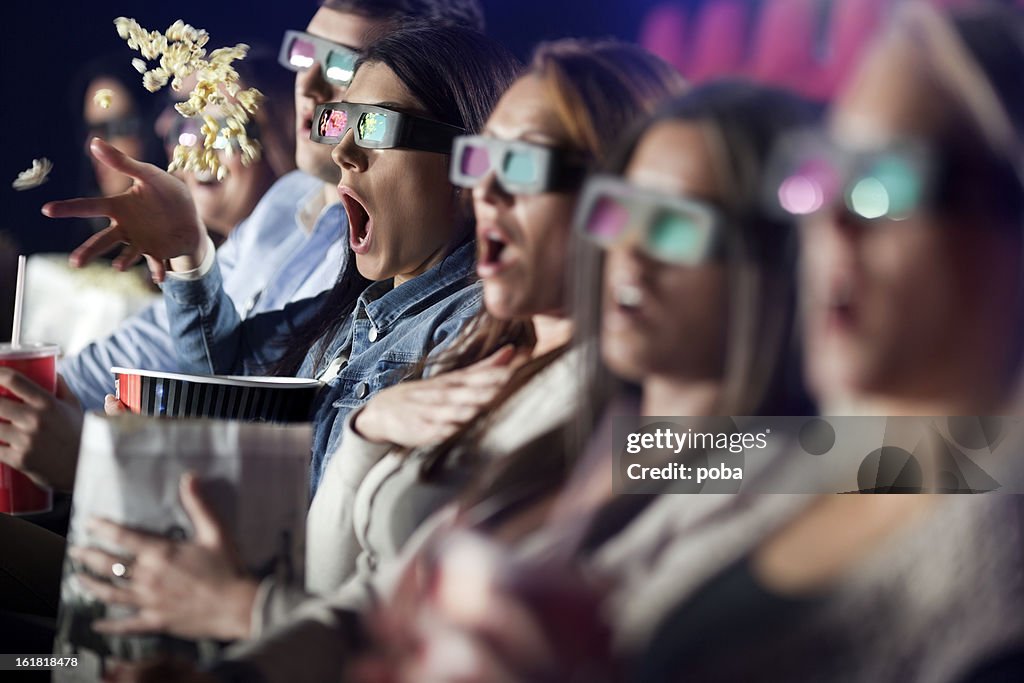 Audience Watching  Movie with 3-d glasses.