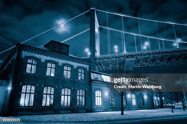 old building and bridge in gothenburg - göteborg stockfoto's en -beelden