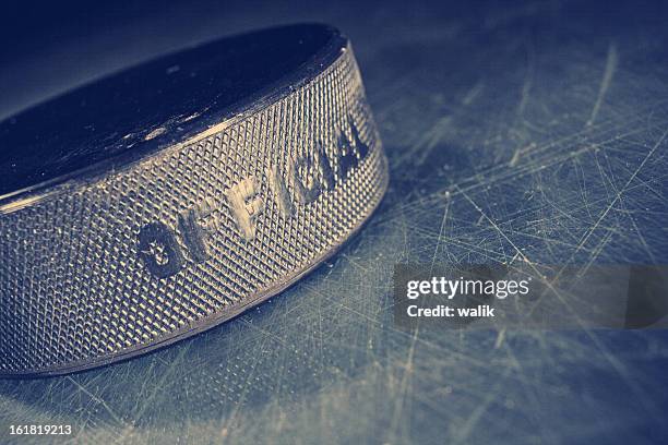 hockey puck - hockey player black background stock pictures, royalty-free photos & images