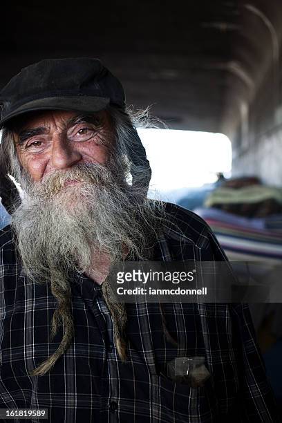 homeless man - homeless man stock pictures, royalty-free photos & images